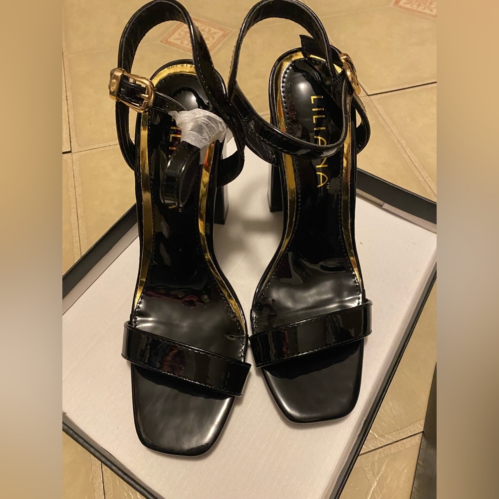 Black patent leather heels